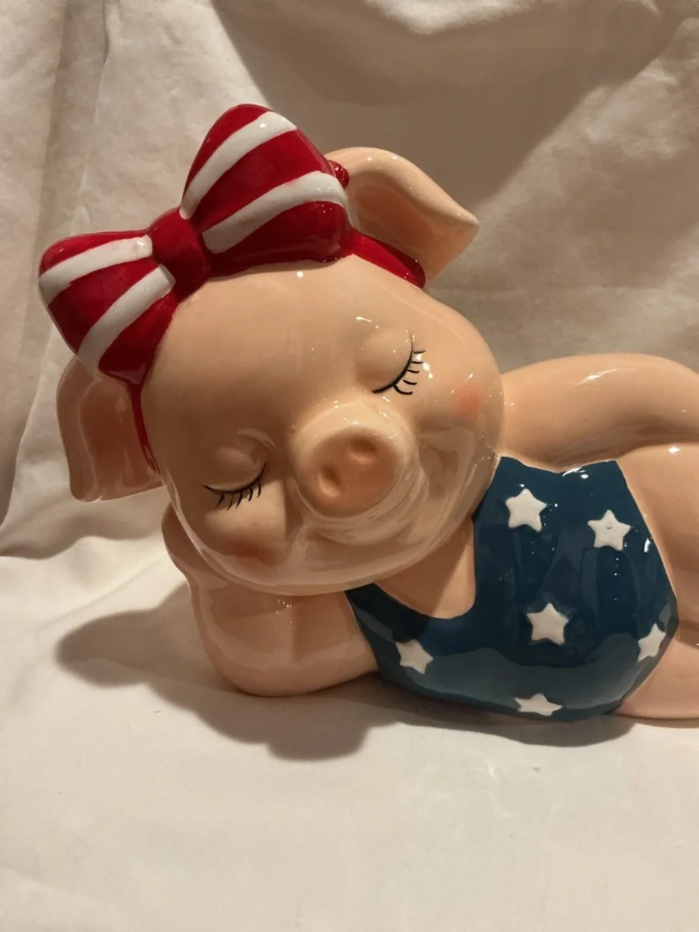 Patriotic Pig Wearing Swimsuit and Red Bow
